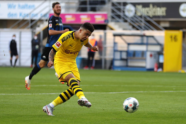 Dortmund’s English midfielder Jadon Sancho scores against Paderborn during their German first division Bundesliga football match in Paderborn on Sunday (AFP photo by Lars Baron)