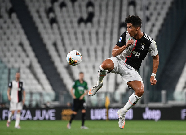 Juventus’ Portuguese forward Cristiano Ronaldo controls the ball during the Italian Serie A football match against Atalanta Bergamo in Turin on Saturday  (AFP photo by Marco Bertorello)