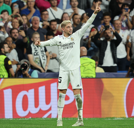 Real Madrid’s Uruguayan midfielder Federico Valverde celebrates after scoring against RB Leipzig during their UEFA Champions League, Group F, first leg match in Madrid on Wednesday  (AFP photo by Thomas Coex)