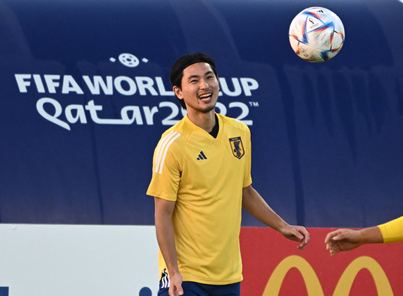 Japan’s midfielder Takumi Minamino takes part in a training session on the eve of their match against Germany at the Qatar 2022 World Cup football tournament in Doha on Tuesday (AFP photo by Philip Fong)