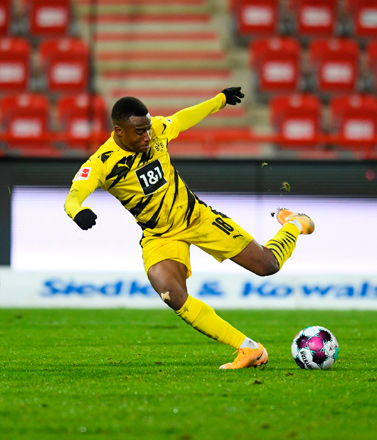 Dortmund’s German forward Youssoufa Moukoko shoots against Union Berlin during their German first division Bundesliga match on Friday  (AFP photo by Annegret Hilse)