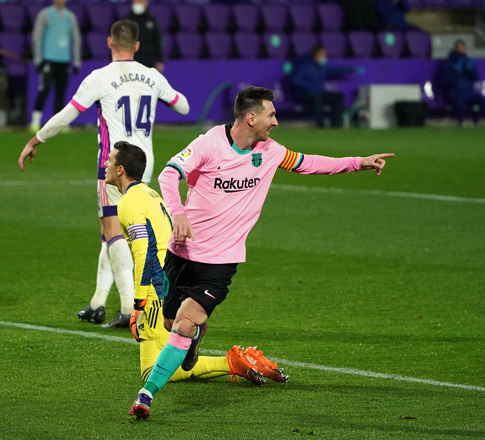 Barcelona’s Argentine forward Lionel Messi celebrates after scoring against Real Valladolid during their Spanish league match in Valladolid on Tuesday (AFP photo by Cesar Manso)
