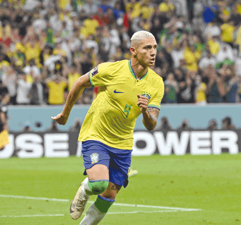 Brazil’s forward Richarlison celebrates scoring a goal against Serbia during their Qatar 2022 World Cup Group G match in Lusail on Thursday (AFP photo by Nelson Almeida)