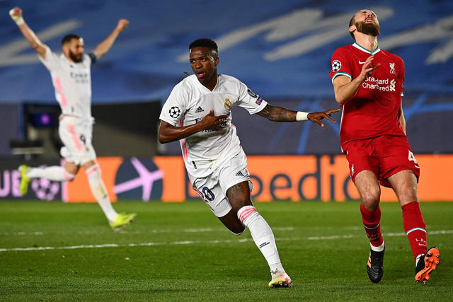 Real Madrid’s Brazilian forward Vinicius Junior (centre) celebrates scoring against Liverpool during their Champions League first leg quarter-final match in Valdebebas, Spain, on Tuesday  (AFP photo by Gabriel Bouys)