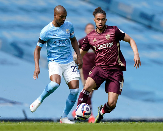 Manchester City’s midfielder Fernandinho fights for the ball with Leeds United’s striker Tyler Roberts during their English Premier League match in Manchester, England, on Saturday  (AFP photo by Tim Keeton)
