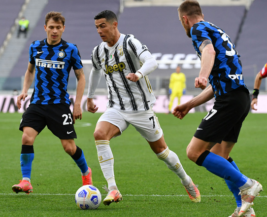 Juventus’ Portuguese forward Cristiano Ronaldo challenges Inter Milan’s Italian midfielder Nicolo Barella (left) during their Italian Serie A match in Turin on Saturday  (AFP photo by Isabella Bonotto)