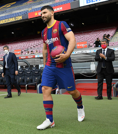 Former Manchester City’s player, Argentine forward Sergio Aguero poses on the pitch of the Camp Nou Stadium in Barcelona during his official presentation as new player of FC Barcelona on Monday (AFP photo by Lluis Gene)
