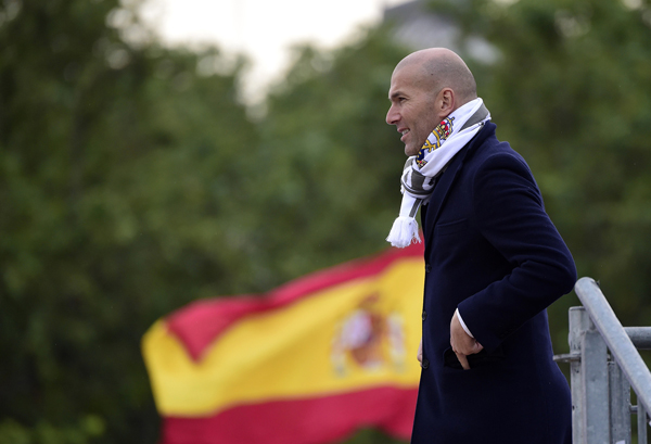 Real Madrid’s French coach Zinedine Zidane celebrates the team’s UEFA Champions League final win on Plaza Cibeles in Madrid on Sunday (AFP photo)