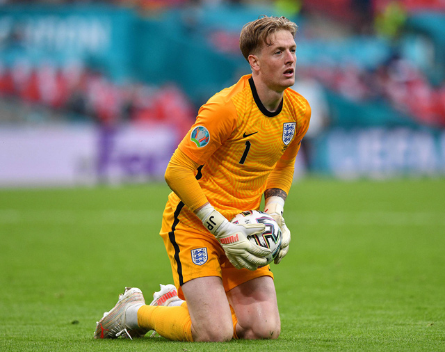 England’s goalkeeper Jordan Pickford holds onto the ball against Germany during their UEFA Euro 2020 round of 16 match in London on Tuesday  (AFP photo by Justin Tallis)