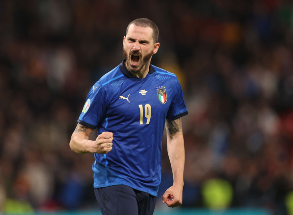 Italy’s defender Leonardo Bonucci celebrates after scoring against Spain in a penalty shootout during the UEFA Euro 2020 semifinal match in London on Tuesday  (AFP photo by Carl Recine)
