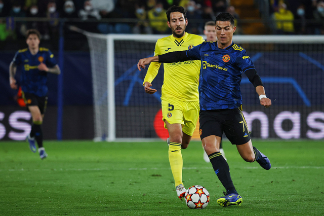Villarreal’s Daniel Parejo (left) vies with Manchester United’s Cristiano Ronaldo during their UEFA Champions League Group F match in Vilarreal on Tuesday  (AFP photo by Jose Jordan)