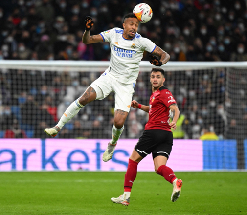 Real Madrid’s Brazilian defender Eder Militao heads the ball against Valencia during their Spanish league match in Madrid on Saturday (AFP photo by Gabriel Bouys)