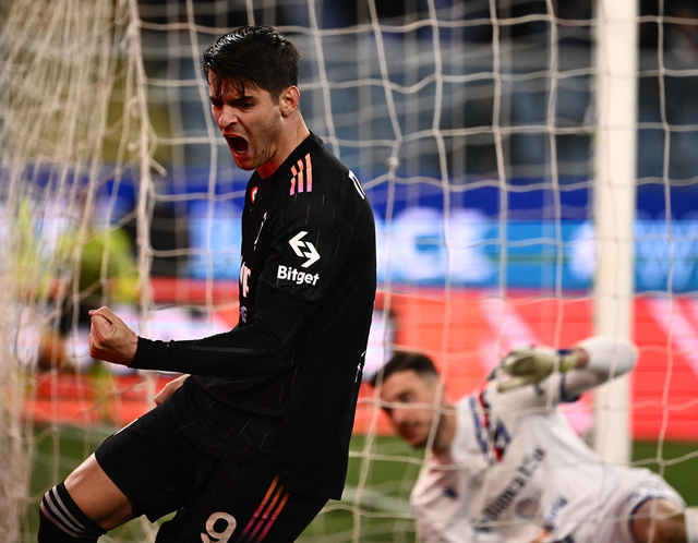 Juventus’ Spanish forward Alvaro Morata (left) celebrates after scoring against  Sampdoria during their Italian Serie A match in Genoa, Liguria, on Saturday  (AFP photo by Marco Bertorello)