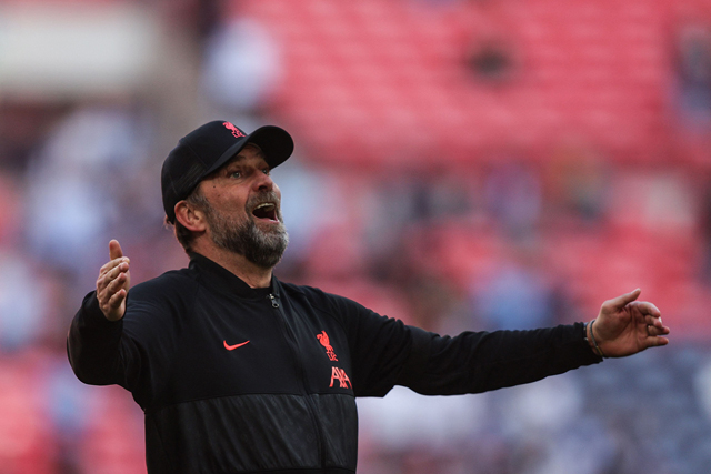 Liverpool’s German manager Jurgen Klopp celebrates at the end of the English FA Cup semifinal match against Manchester City in London on Saturday  (AFP photo by Adrian Dennis)