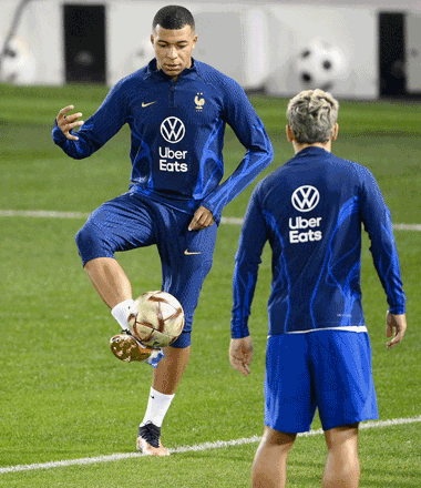 France’s Kylian Mbappe and Antoine Griezmann attend a training session at the Al Sadd SC training centre in Doha on Friday, during the Qatar 2022 World Cup tournament  (AFP photo by Franck Fife)