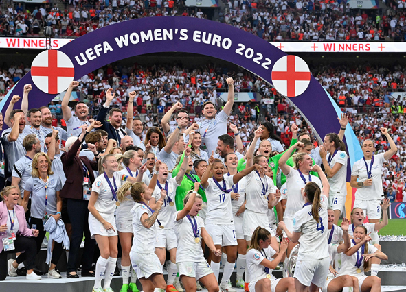 England’s players celebrate with the trophy after their win in the UEFA Women’s Euro 2022 final match against Germany in London, on Sunday (AFP photo by Justin Tallis)