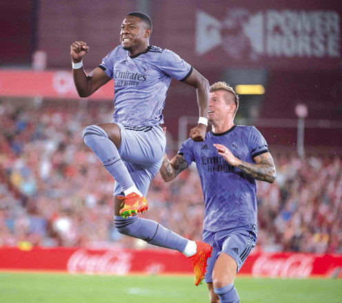Real Madrid’s Austrian defender David Alaba (front) celebrates scoring against Almeria during their Spanish league match in Almeria on Sunday (AFP photo by Jorge Guerrero)