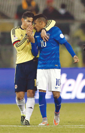 Colombia’s James Rodriguez (left) chats with Brazil’s Neymar after the end of their first round 2015 Copa America match in Santiago on Wednesday (Reuters photo by Ivan Alvarado)
