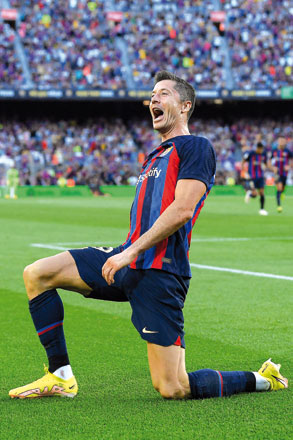 Barcelona’s Polish forward Robert Lewandowski celebrates after scoring against Real Valladolid during their Spanish League match in Barcelona on Sunday (AFP photo by Josep Lago)