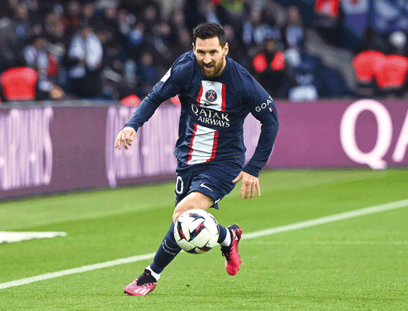 Paris Saint-Germain’s Argentine forward Lionel Messi runs with the ball against Toulouse during their French L1 match in Paris on Saturday (AFP photo by Alain Jocard)