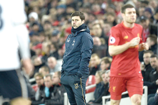 Tottenham Hotspur’s Argentinian head coach Mauricio Pochettino watches on the touchline during the English Premier League match against Liverpool on Saturday  (AFP photo by Oli Scarff)