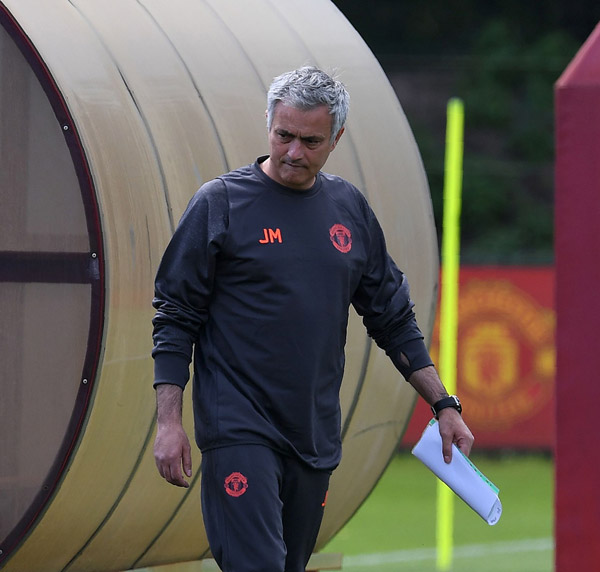 Manchester United’s Portuguese manager Jose Mourinho arrives to attend a team training session at the club’s training complex near Carrington, England, on Tuesday, on the eve of their UEFA Europa League final football match against Ajax  (AFP photo by Paul Ellis)