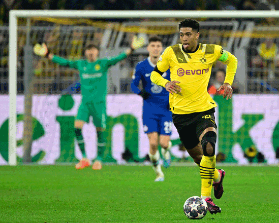 Dortmund’s midfielder Jude Bellingham runs with the ball against Chelsea during their UEFA Champions League, first-leg, round of 16 match in Dortmund, Germany, on Wednesday (AFP photo by John Macdougall)
