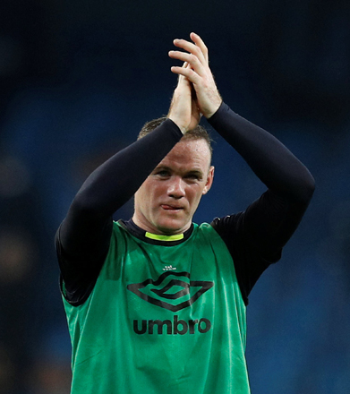Everton’s Wayne Rooney applauds fans after the English Premier League match against Manchester City in Manchester on Monday  (Reuters photo by Phil Noble)