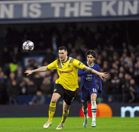 Chelsea’s striker Joao Felix (right) vies with Dortmund’s defender Niklas Sule during their UEFA Champions League round of 16 second-leg match in London on Tuesday (AFP photo by Adrian Dennis)