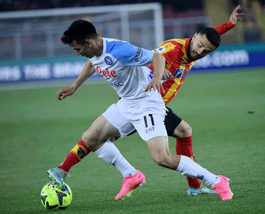 Napoli’s forward Hirving Lozano (left) fights for the ball with Lecce’s midfielder Kristoffer Askildsen during their Italian Serie A match in Lecce on Friday (AFP photo by Filippo Monteforte)