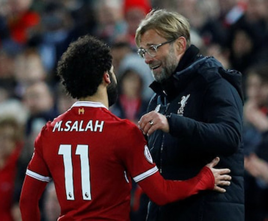 Liverpool’s manager Jurgen Klopp talks to Mohamed Salah in a file photo  (Reuters photo)