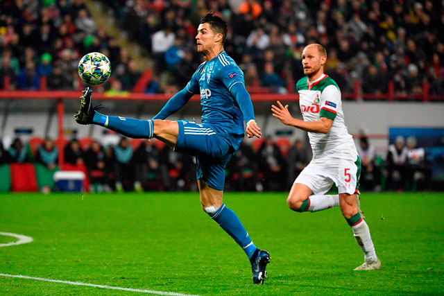 Juventus’ Portuguese forward Cristiano Ronaldo controls the ball during the UEFA Champions League group D football match against FC Lokomotiv Moscow in Moscow on Wednesday (AFP photo by Alexander Nemenov)