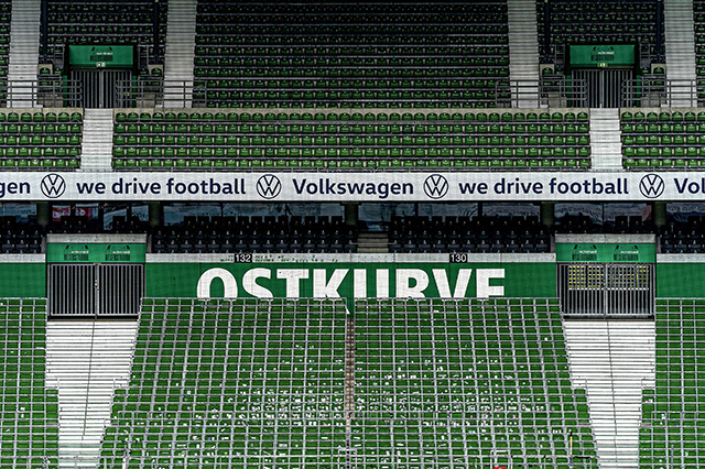 The empty stands are pictured prior to the German first division Bundesliga football match between Werder Bremen and Bayer 04 Leverkusen on Monday in Bremen, northern Germany (AFP photo by Marvin Ibo Guengoer)