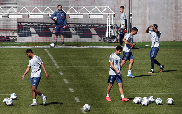 Bayern Munich's players attend a training session of the German first division Bundesliga team FC Bayern Munich, at the team training ground in Munich, southern Germany, on Monday (AFP photo by Christof Stache)