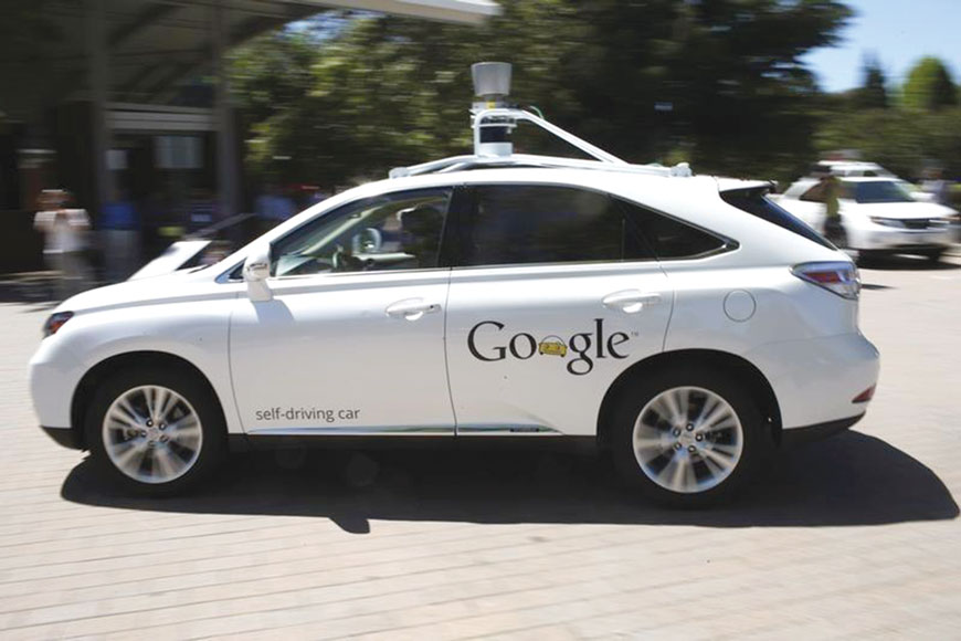  A Google self-driving vehicle drives around the parking lot at the Computer History Museum after a presentation in Mountain View, California, in this May 13, 2014 file photo (Reuters photo by Stephen Lam)