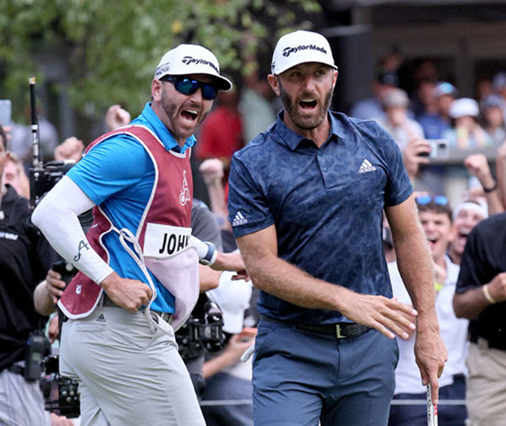 Dustin Johnson (right) of the United States celebrates after winning the LIV Golf Invitational-Boston  at The International in Bolton, Massachusetts, on September 4, 2022 (AFP photo by Andy Lyons) 
