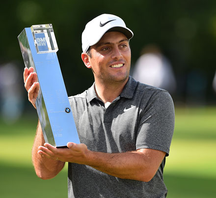 Italy’s Francesco Molinari poses with the winner’s trophy of the golf PGA Championship in Surrey, England, on Sunday (AFP photo by Glyn Kirk)