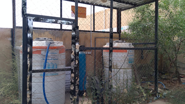 The system installed in the school’s backyard receives the greywater, treats it and then pumps it to irrigate the school’s garden (Photo courtesy of Mohammad Jaber)