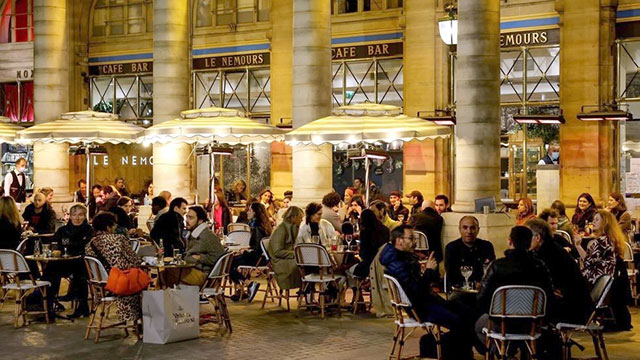 French cafes and bars are set to reopen their terraces on May 19 (AFP photo by Ludovic Marin)