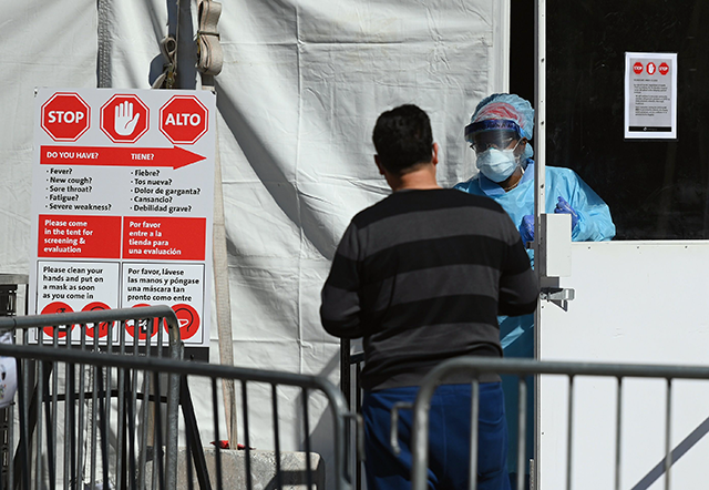 A medical worker walks out of a coronavirus, COVID-19, testing tent at Brooklyn Hospital Centre in New York City, in undated photo (AFP photo)