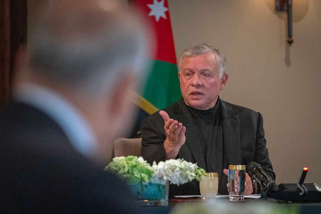 His Majesty King Abdullah speaks during a meeting held at Al Husseiniya Palace on Monday  (Photo courtesy of Royal Court)