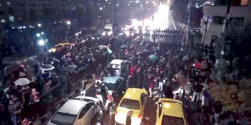 Protesters are seen near the Fourth Circle, where a demonstration has blocked the street leading to the Interior Circle from both directions on Thursday (Photo courtesy of Rakan Hiasat)
