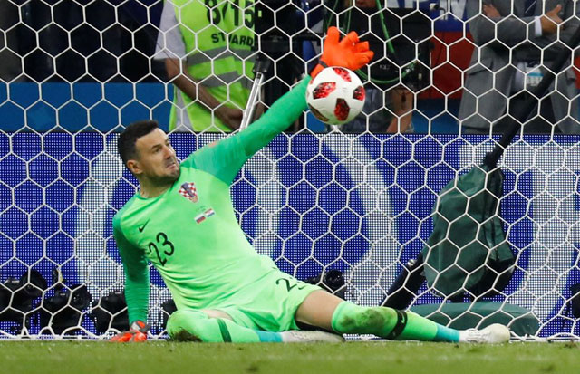 Croatia’s Danijel Subasic saves a penalty during their penalty shootout against Russia at the 2018 World Cup in Sochi on Saturday (Reuters photo by Kai Pfaffenbach)