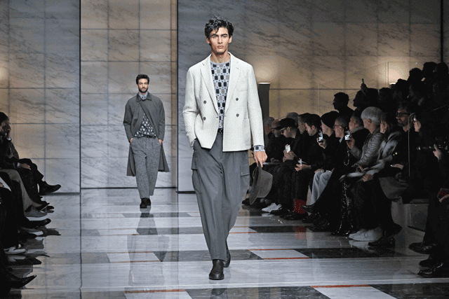 A model presents a creation of Giorgio Armani during the Autumn-Winter 2023-2024 Men’s fashion show as part of the Milan Fashion Week on Monday  (AFP photo by Miguel Medina)