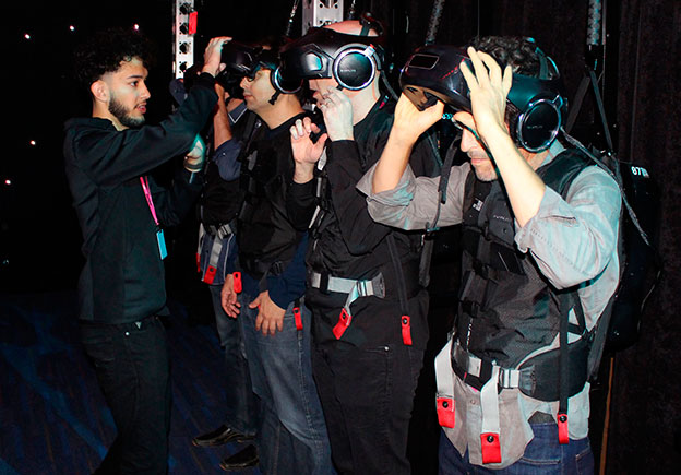 TED Conference goers put on virtual reality gear created by US startup The Void in Vancouver on Wednesday. The annual TED Conference is attended by thousands of people and is held from April 10-14 (AFP photo)