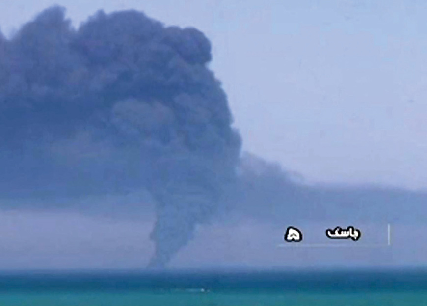 In this image grab taken from a broadcast by Islamic Republic of Iran Broadcasting on Wednesday shows smoke billowing from Iranian Kharg 431 supply navy ship in Gulf of Oman (AFP photo)