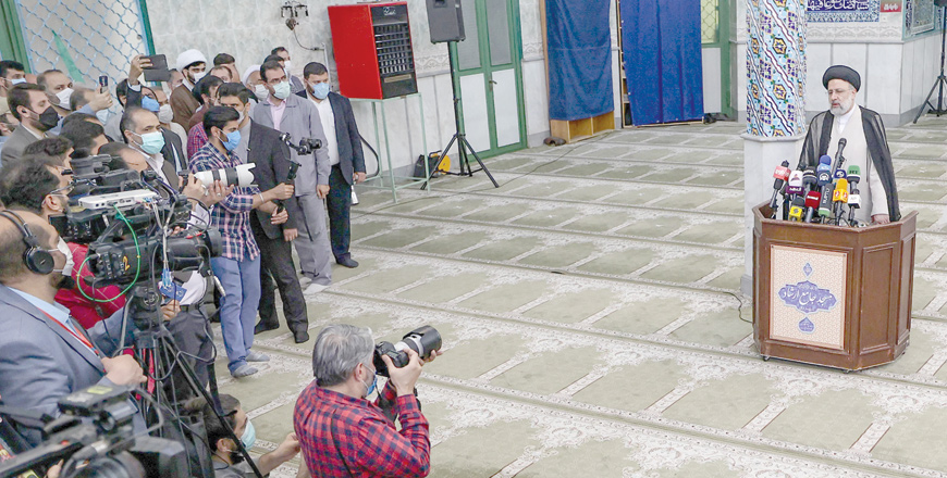 Iranian ultraconservative cleric and presidential candidate Ebrahim Raisi gives a news conference after voting in the presidential election, at a polling station in the capital Tehran, on Friday (AFP photo)