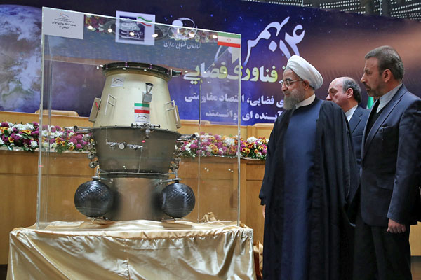 Iran's President Hassan Rouhani looks at an exhibit during a ceremony marking National Day of Space Technology in Tehran, Iran, on Wednesday (Reuters photo)