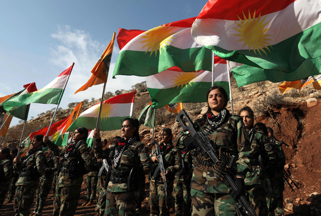 Female Kurdish Peshmerga fighters affiliated with Iran's separatist Kurdistan Freedom Party, are pictured at a base in an undisclosed location in the Erbil province, the capital of the autonomous Kurdish region of northern Iraq, on December (AFP photo)