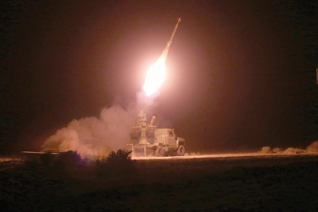 This handout photo made available by the Iranian army office on Wednesday shows an anti-aircraft missile launcher firing during the second day of a joint military exercise between the Iranian army and the Islamic Revolutionary Guard Corps (AFP photo)
